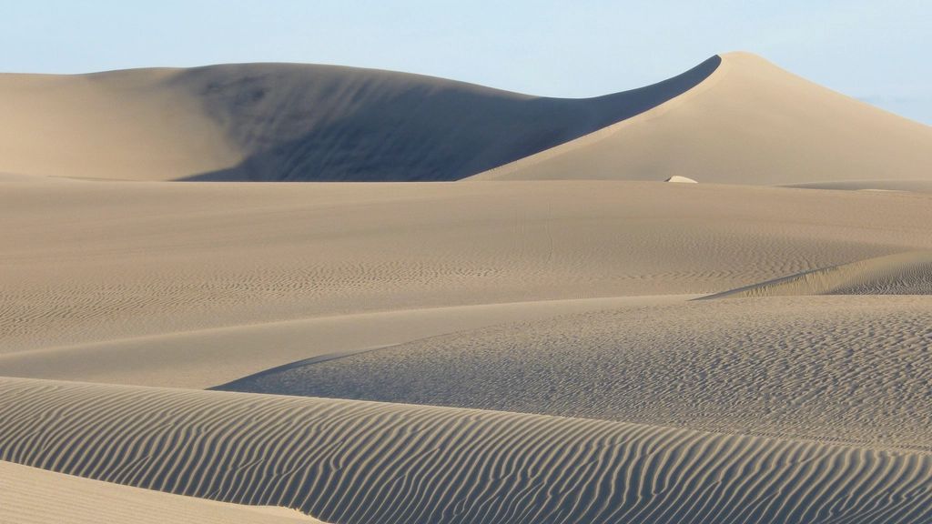 Open desert running to the hills